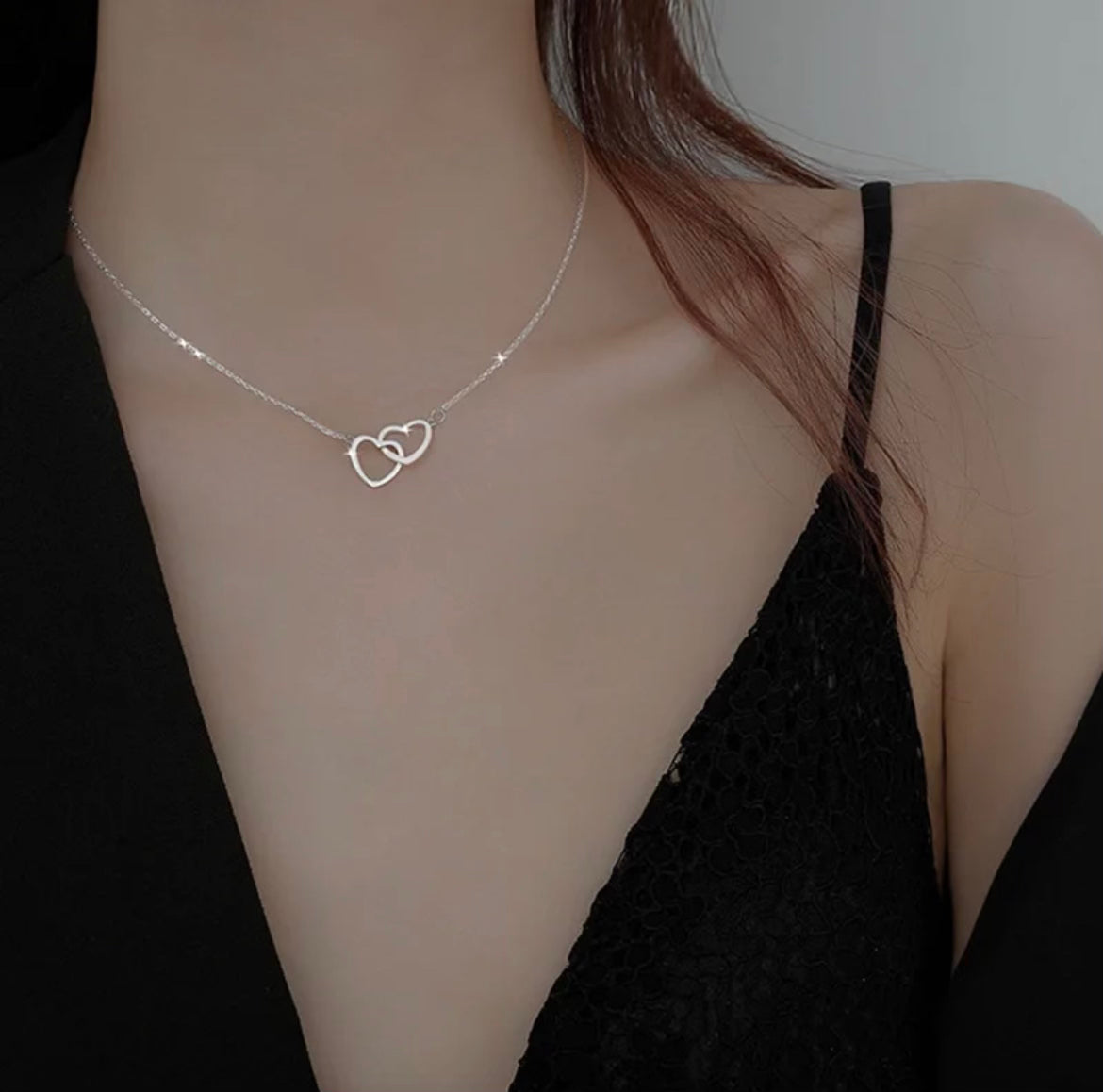 Double Heart Necklace 
Interlocking Hollow Heart Pendant