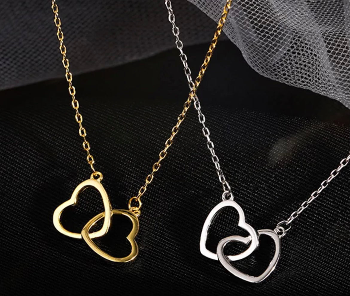 Double Heart Necklace 
Interlocking Hollow Heart Pendant